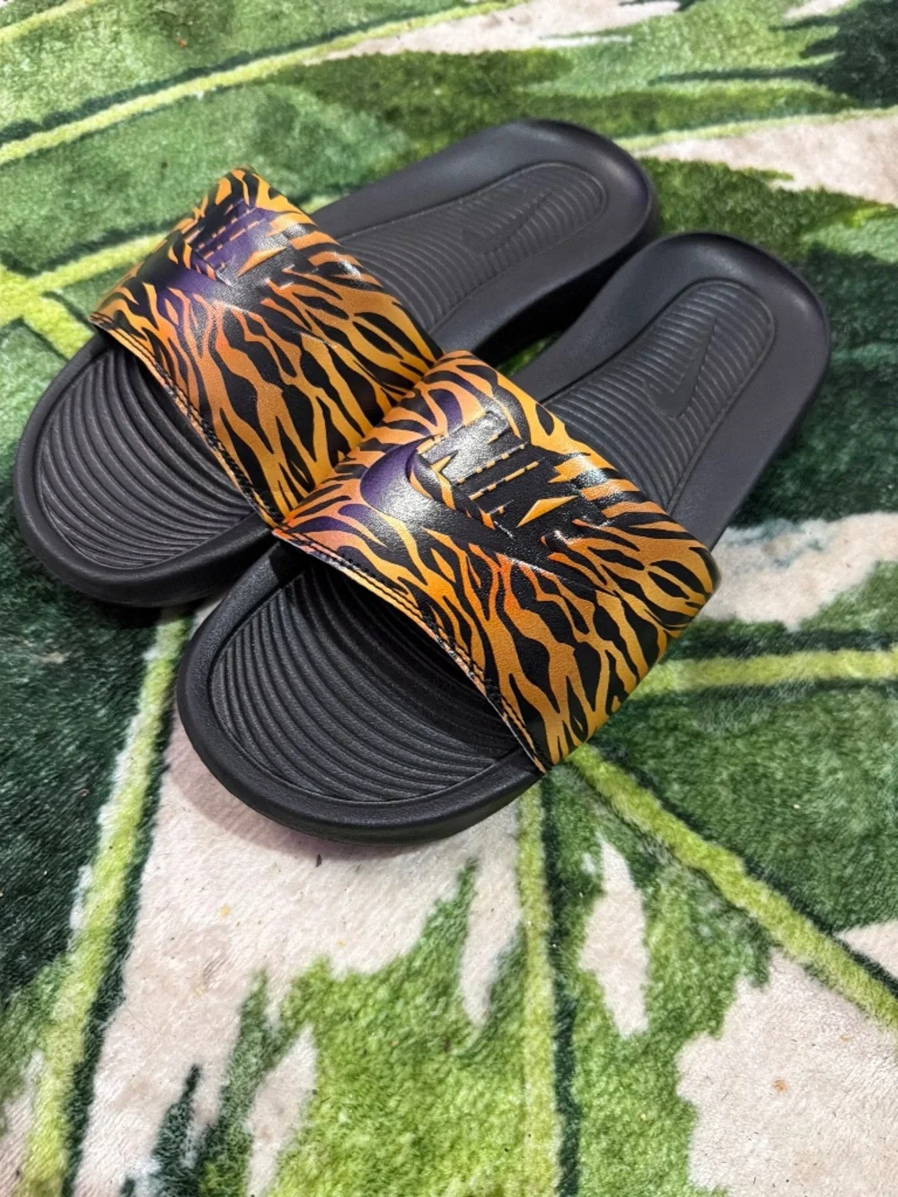 Nike Women's Black Slides with Orange Tiger-Print Strap